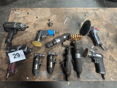 a lot of tools that are sitting on a table