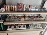 a lot of makeup products on display in a store