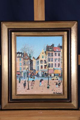 a picture of a painting on a shelf in front of a blue wall