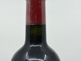 a bottle of wine that is sitting on a table