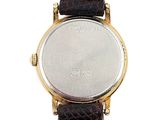 an image of a close up of a wrist watch on a white background