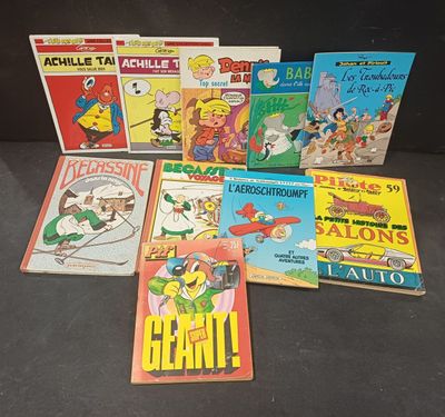 several children ' s comics are lined up on a black surface