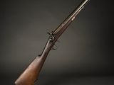 un vieux fusil sur fond noir