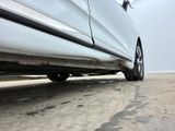 a car that is parked on the side of the road
