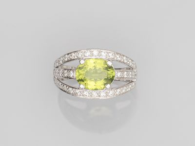 a peridot and diamond ring