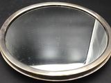 a mirror that is sitting on a table