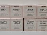 six boxes of lubrac are stacked on top of each other