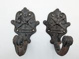 pair of antique cast iron door knockets