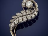 a diamond and gold broochle broochle
