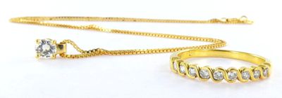 yellow gold plated necklace and ring set with clear crystal stones