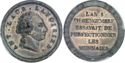a close up of a coin with a woman ' s face on it