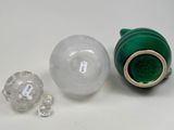 three different types of glass vases on a table