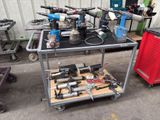 a table with tools on it in a garage