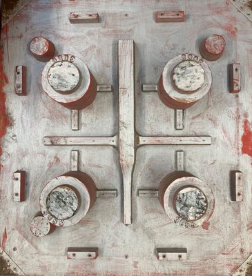 a close up of a fire hydrant on the side of a building