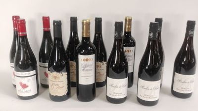 several bottles of wine are lined up in a row on a white surface