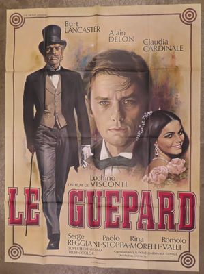 french movie poster for the film le guepard, with a man in a tuxedo and a woman in a top hat