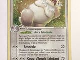 a close up of a pokemon card on a white surface