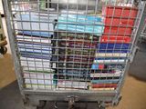a cart with many books in it in a store