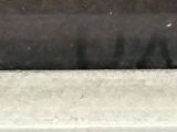 an image of a close up view of a person riding a skateboard