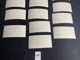 a lot of papers that are on a table