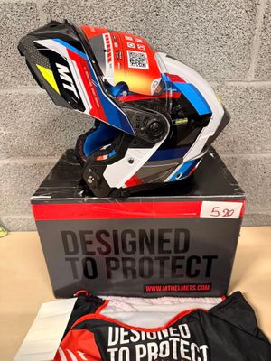 a helmet on top of a box on a table