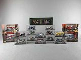a lot of motorcycle models on display in a display case