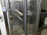 an image of a commercial kitchen with stainless steel appliances