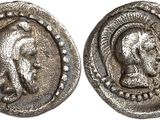 a silver coin with an image of a woman on it