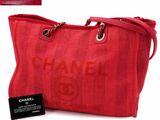 a chanel bag with a tag on the front of it