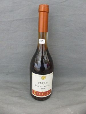 a bottle of wine that is sitting on a table