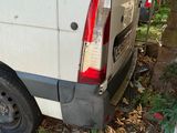 a van that is parked on the side of the road