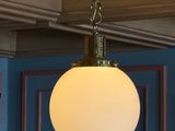 a light that is hanging from the ceiling in the room