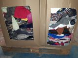 a picture of a closet full of clothes in a room
