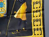 a scarf with a picture of an egyptian man on it