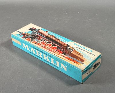 a box with a train on it sitting on a table