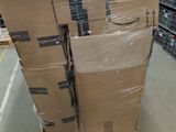 boxes are stacked on a pallet in a large warehouse