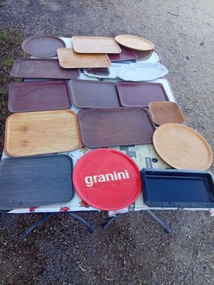 a table that has a lot of plates and trays on it