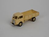 a toy truck that is sitting on a white surface