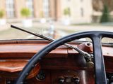 a close up of a steering wheel and dashboard of a car