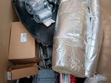 a cardboard box filled with assorted items in it