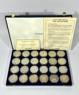 an open case with a lot of silver coins in it