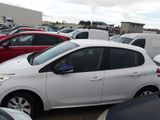many cars parked in a parking lot in a parking lot