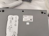 a close up of a nintendo wii game controller and a nintendo wii game controller