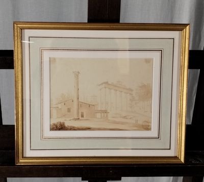 une vieille photo d'une photo d'un bâtiment posé sur une table