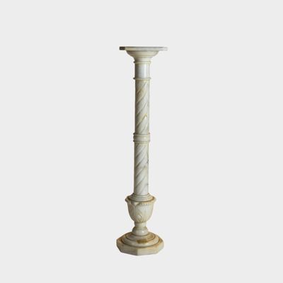 an image of a tall marble candle holder on a white background