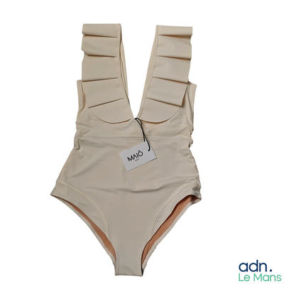 a tan bathing suit with a tag on it