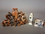 three vases sitting next to each other on a table