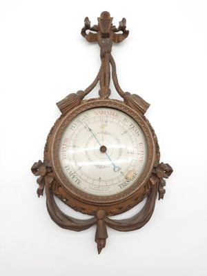 a clock that is hanging on the wall on the wall