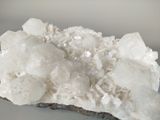 a large piece of crystal on a rock on a table