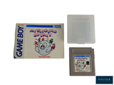 une Nintendo Game Boy avec une cartouche dedans